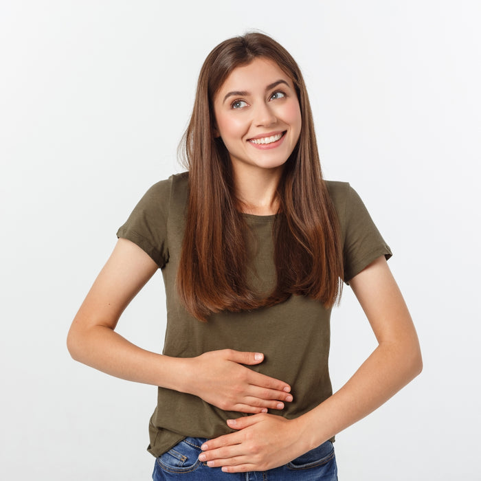 Woman wearing a green t-shirt on a white background